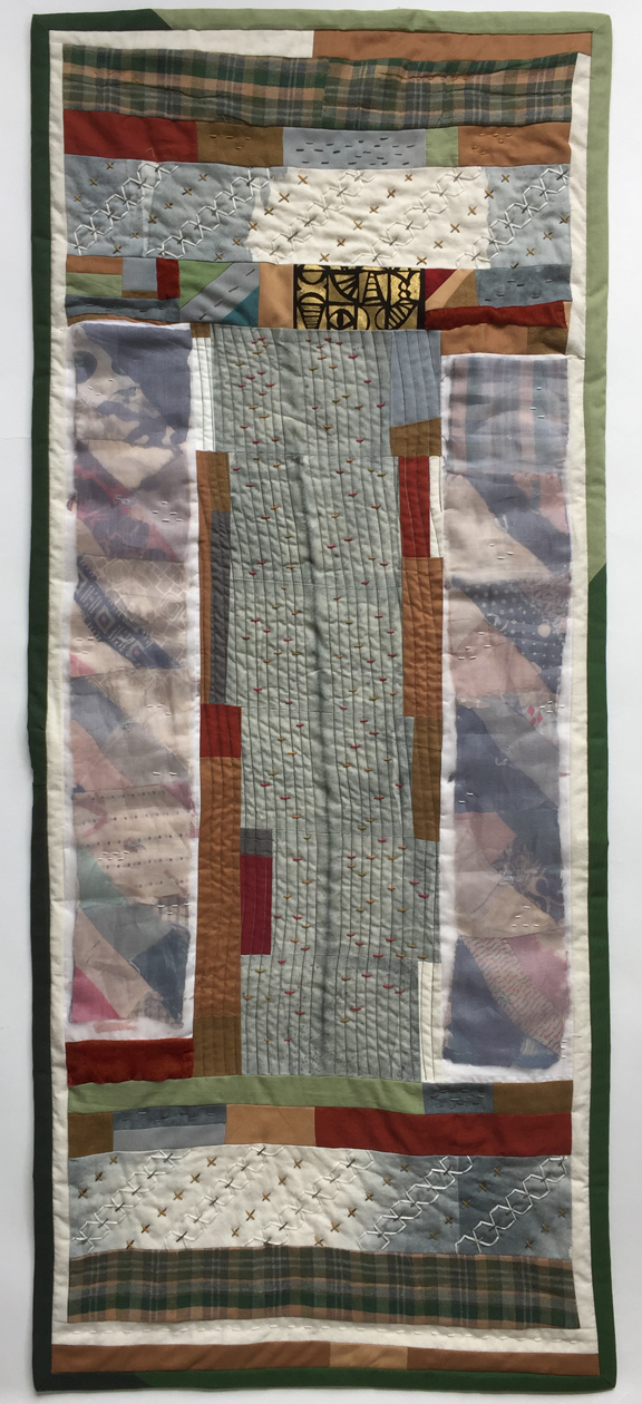 quilt in long panels with line down center