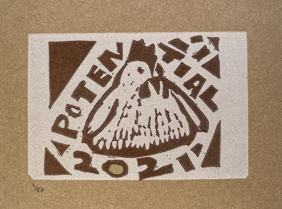 letterpress printed linocut plump hen on the year 2021 and the word potential above it